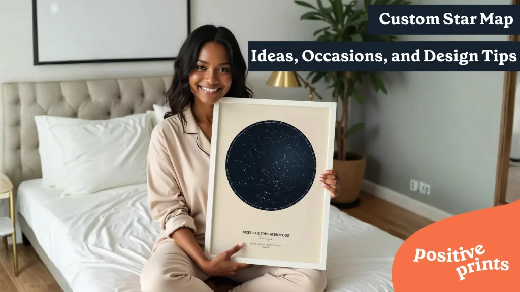 Woman sitting on a bed holding a framed custom star map print in a cozy bedroom setting